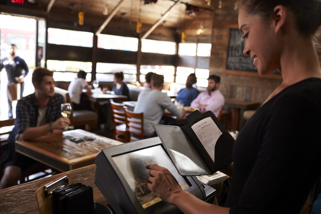 young woman preparing bill at restaurant using tou 2023 11 27 05 11 33 utc